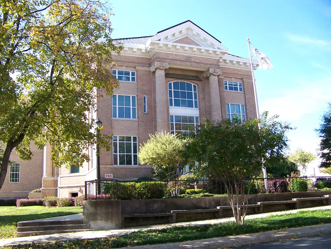 The columned brick 1910 Gaston County Courthouse in downtown Gastonia, NC