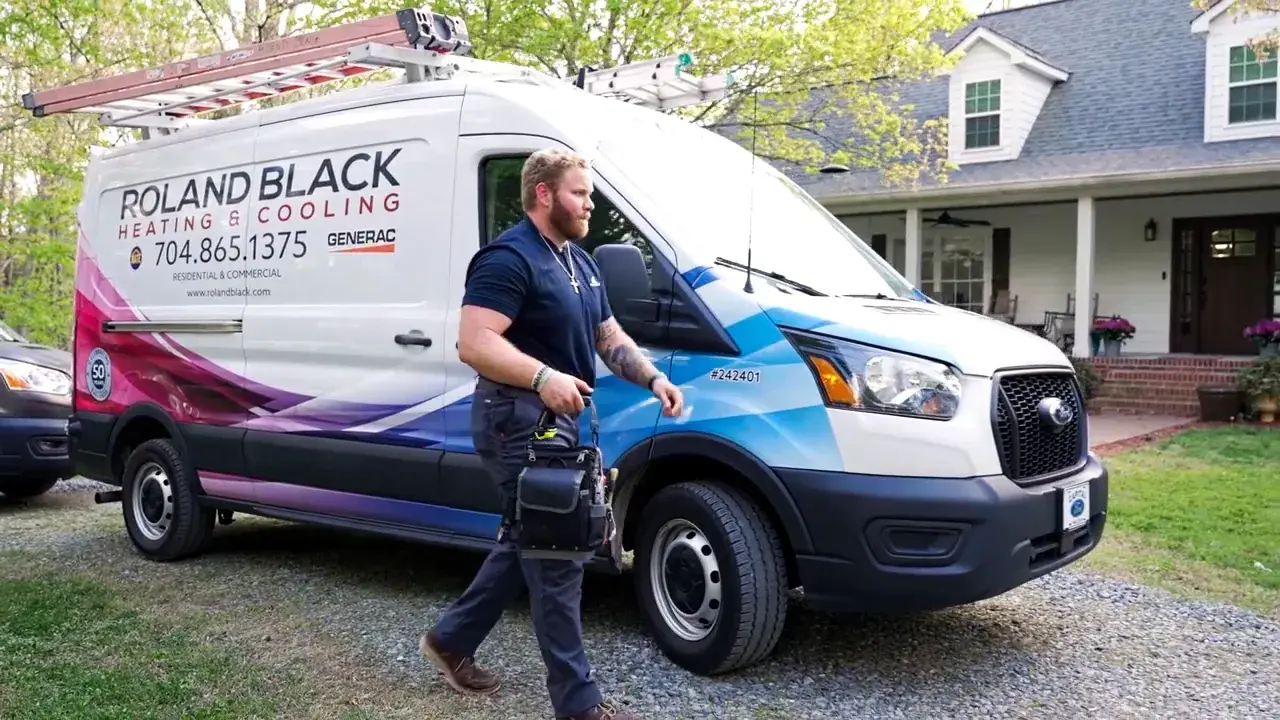 Roland Black electrician walking up to a Gaston County home for a panel repair call