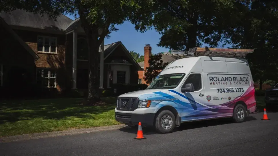 Roland Black service van parked at a home for an EV charger installation in Gaston County, NC