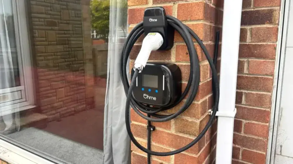 Level 2 EV charger mounted on the brick wall of a home in Gastonia, NC Level 2 EV charger mounted on the brick wall of a home in Gastonia, NC