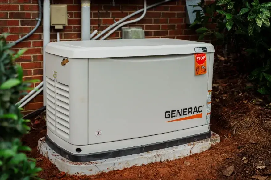 Generac standby generator installed on a concrete pad beside a home in Gastonia, NC Generac standby generator installed on a concrete pad beside a home in Gastonia, NC