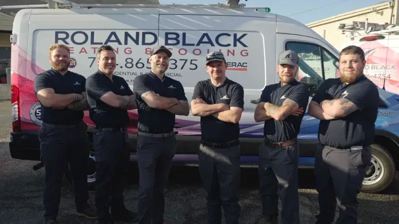 Roland Black technicians standing in front of a company van in Gastonia, NC Roland Black technicians standing in front of a company van in Gastonia, NC
